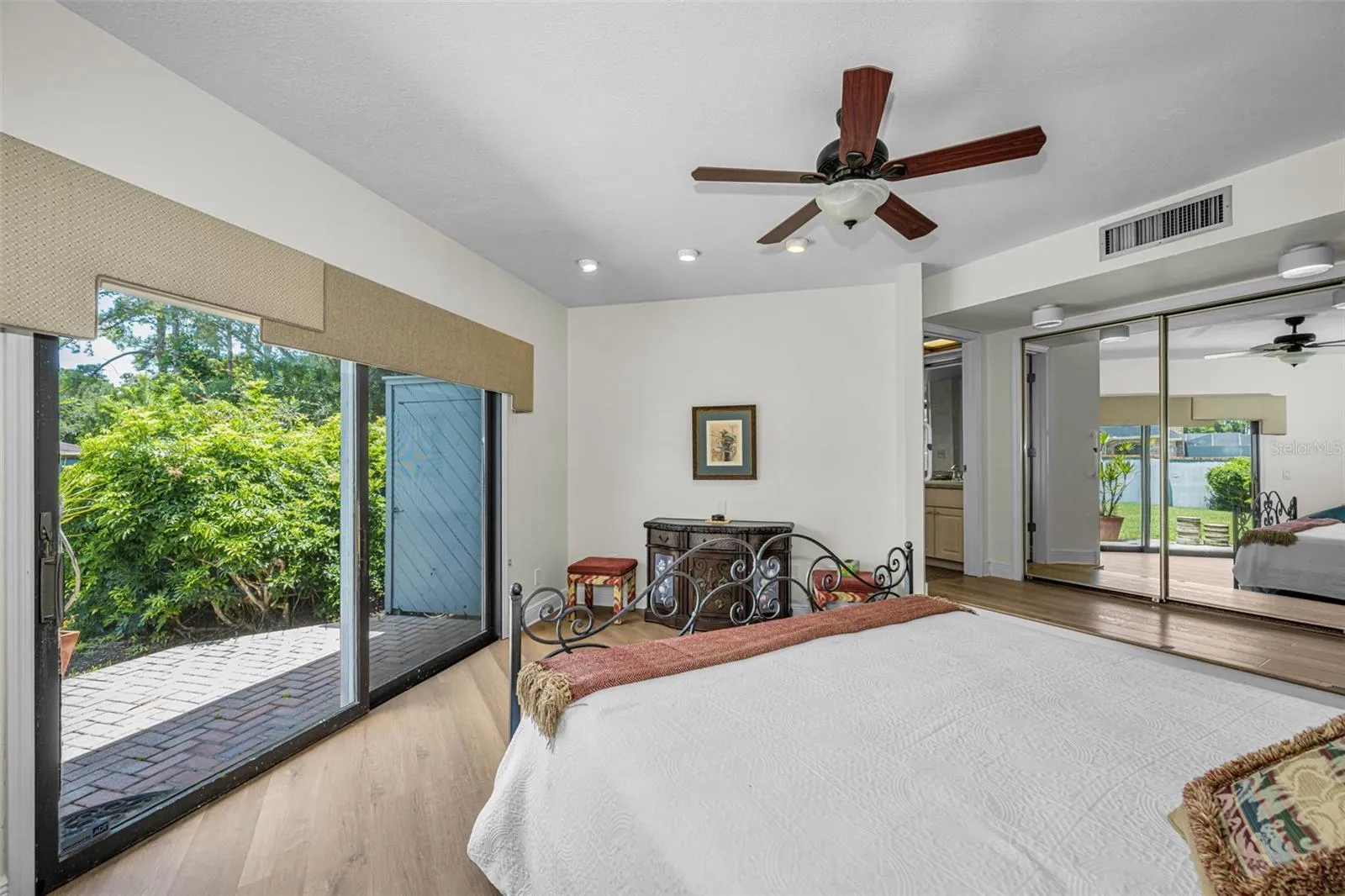 Master suite looking out to the back patio and back yard. One of the largest private back yards in the community.