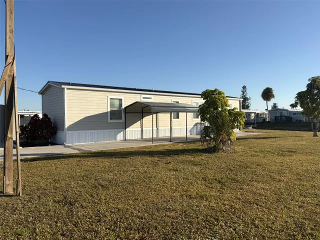 New mobile home located in Holiday Mobile Estate.  Home backs up to RedFish Waterway and has plenty of fish for the fisherman in your household.