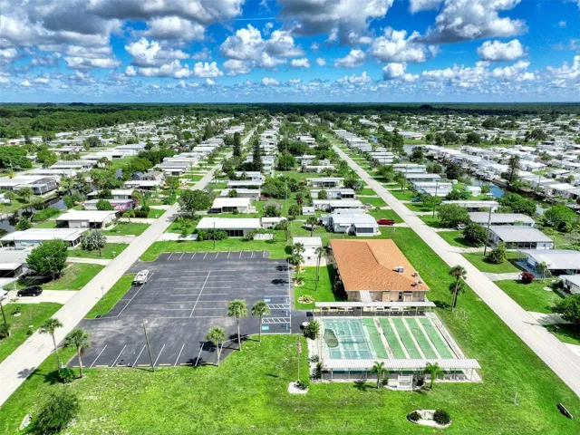 VIEW 2 OF THE CLUB HOUSE.  NOTE TENNIS COURTS