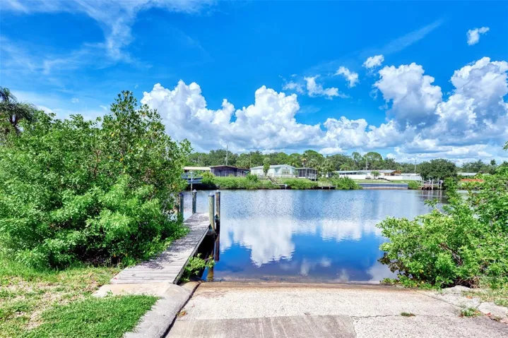 RAMP TAKES YOU INTO THE WATERWAY THAT ALLOWS YOU ACCESS TO THE INTERCOASTAL AND EVENTUALLY THE GULF OF MEXICO.