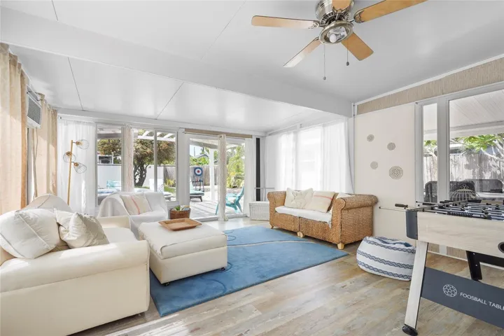 ?Bonus Game Room + Lounge – The large Florida room at the rear of the home offers plenty of room to unwind, host guests, or enjoy foosball and lounge seating with views of the private backyard.