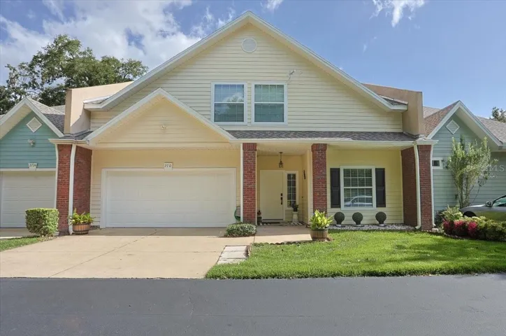 Double lot in Williamsburg. Front entry two-car garage plus driveway parking and 2-4 additional parking spaces.