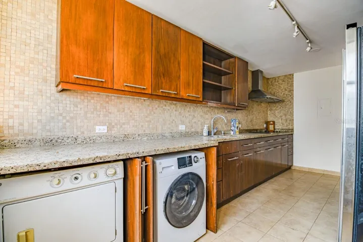 Wsher and dryer inside the kitchen