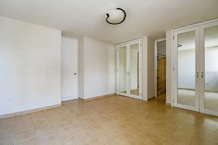 Large master with ocean view from window