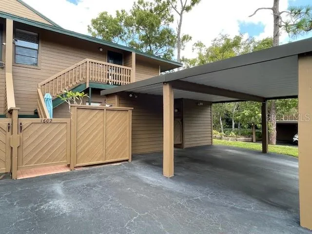 Covered parking & only entrance to the condo