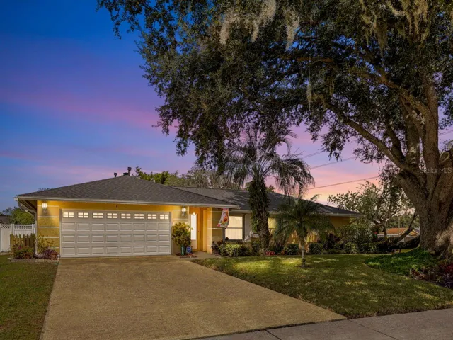Beautiful corner lot with mature trees and brand new roof as of October 2025