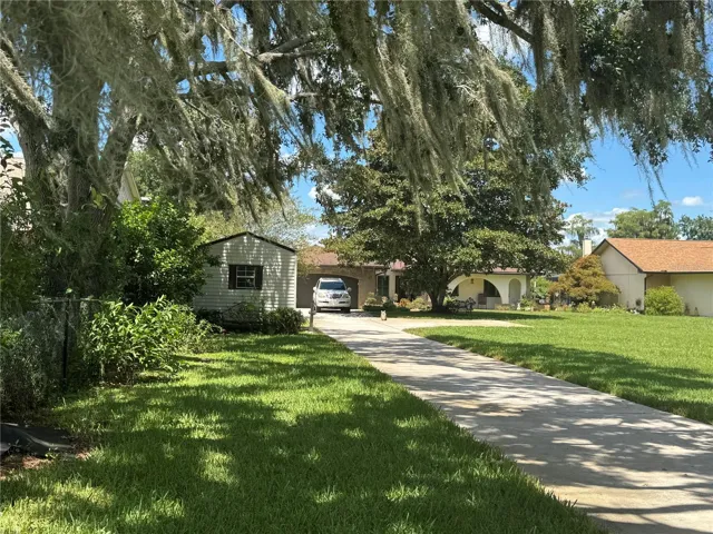 From front gate towards home.  About 300 +/- from street. Plenty of room for Family Suite add-on, additional garage, steel building, etc
