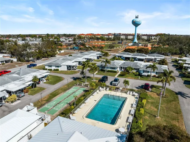 Clubhouse with pool and shuffleboard