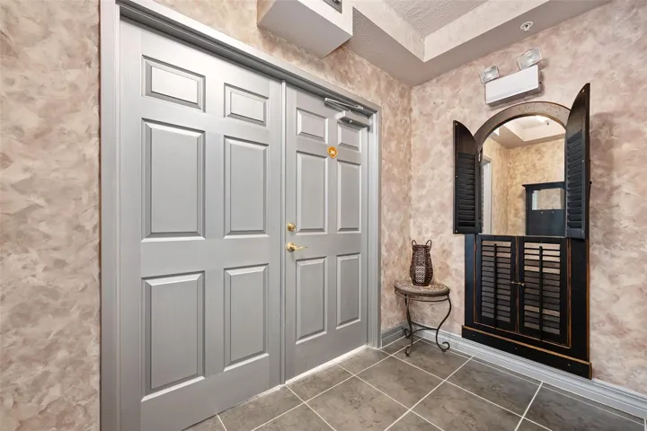 ELEVATOR OPENS TO PRIVATE FOYER