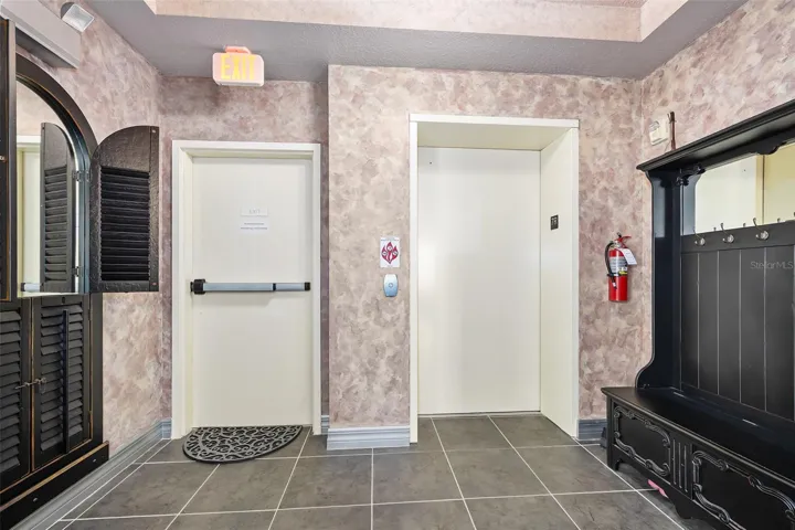 SEMI PRIVATE ELEVATOR OPENS TO OWNERS FOYER