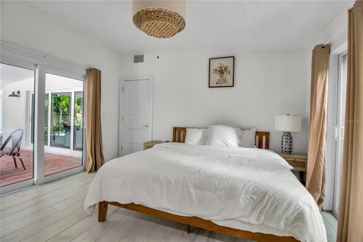 Primary Bedroom with doors to lanai