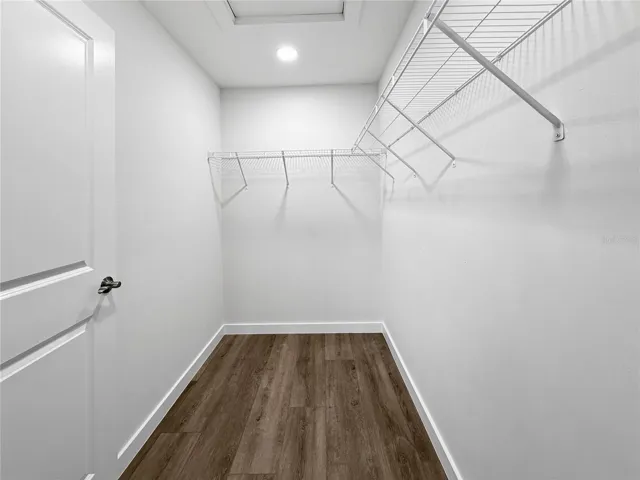 Primary Walk-In Closet - photos of similar model, finishes may differ