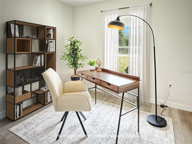 Office/Den - photos of similar model, finishes may differ. Partial virtual staging