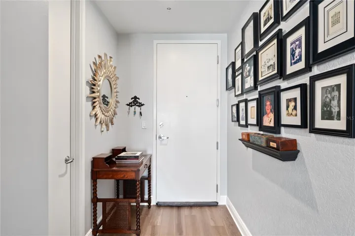 Foyer, door to the left leads into the laundry and storage room