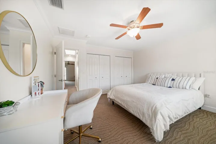 Ample space in third bedroom on third level with wall to wall closet space!