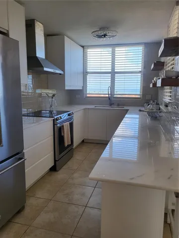 The Kitchen: Light, Bright, white and functional.  Giving it that natural light when in the kitchen