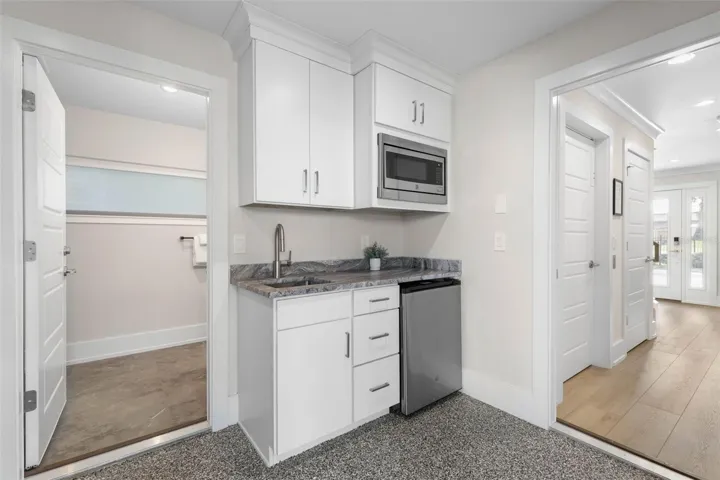 Kitchenette off first floor game room.