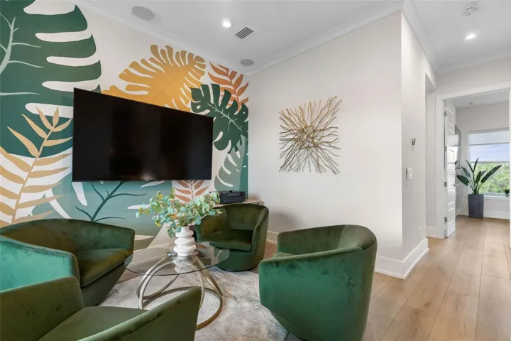 Bold, vibrant, and fun—this cozy bonus room perfect for stylish family nights or laid-back lounging in luxury.