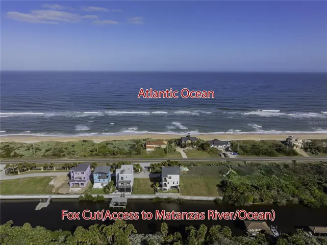 Enjoy the best of both worlds—deeded access to the Atlantic Ocean and a canal-ready backyard with dock potential to the Matanzas River.