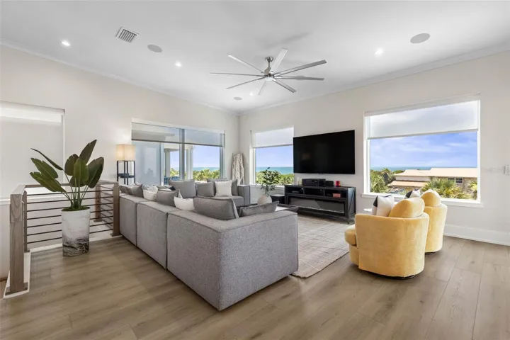 Enjoy stunning ocean views from the light-filled living room, where expansive windows and an open layout create the perfect coastal retreat.