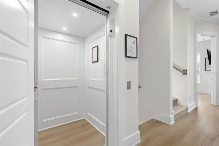 Or, skip the stairs and take the elevator—conveniently located just off the garage and game room—making it easy to carry groceries straight to the main living area.