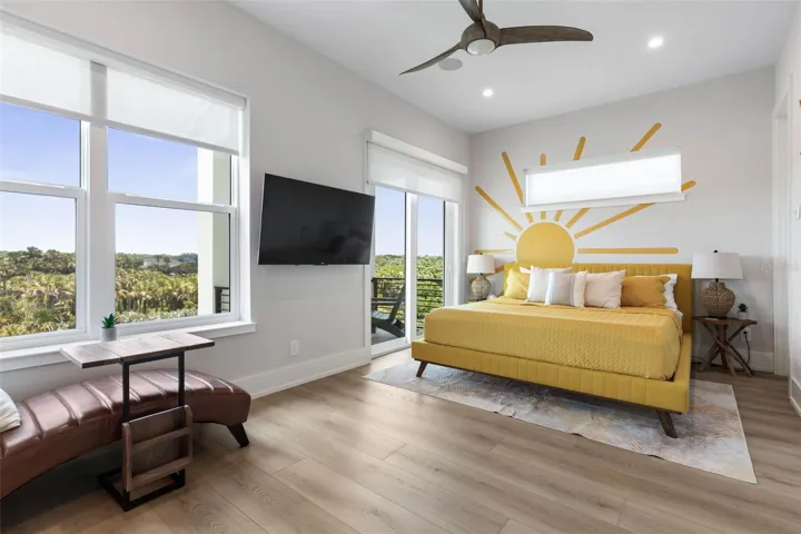 Wake up to sunrise views in this bright and airy bedroom retreat, complete with balcony access and a private ensuite for ultimate comfort.