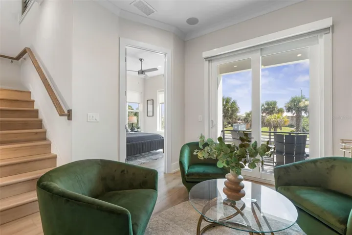 Bonus room or den offers the perfect spot for happy hour or movie night, complete with balcony access.