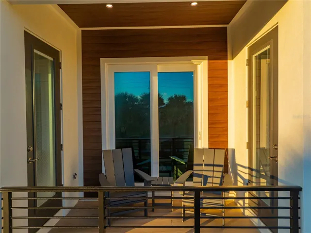 This inviting balcony offers 3-way access and the perfect spot to enjoy ocean breezes and morning sunrise