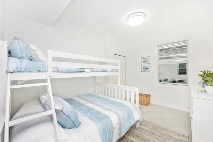 3rd bedroom with twin over queen bunk beds