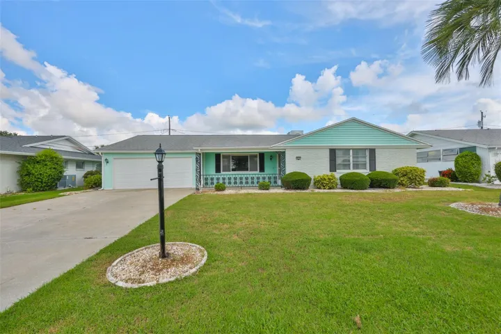 Way, Double Car Garage, Nicely Manicured Lawn
