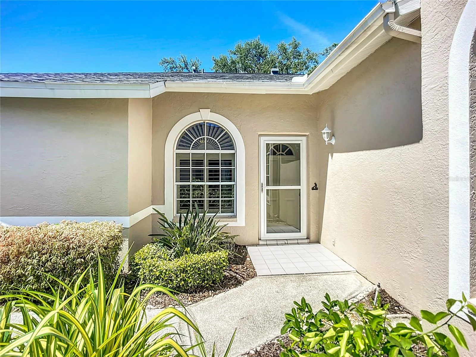 Front entry with landscaped courtyard