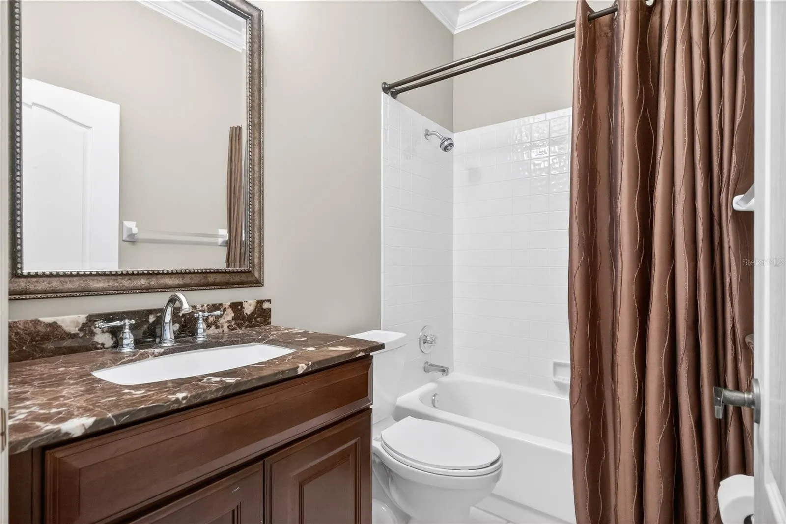 Bath two just outside the second bedroom with tub/shower combo