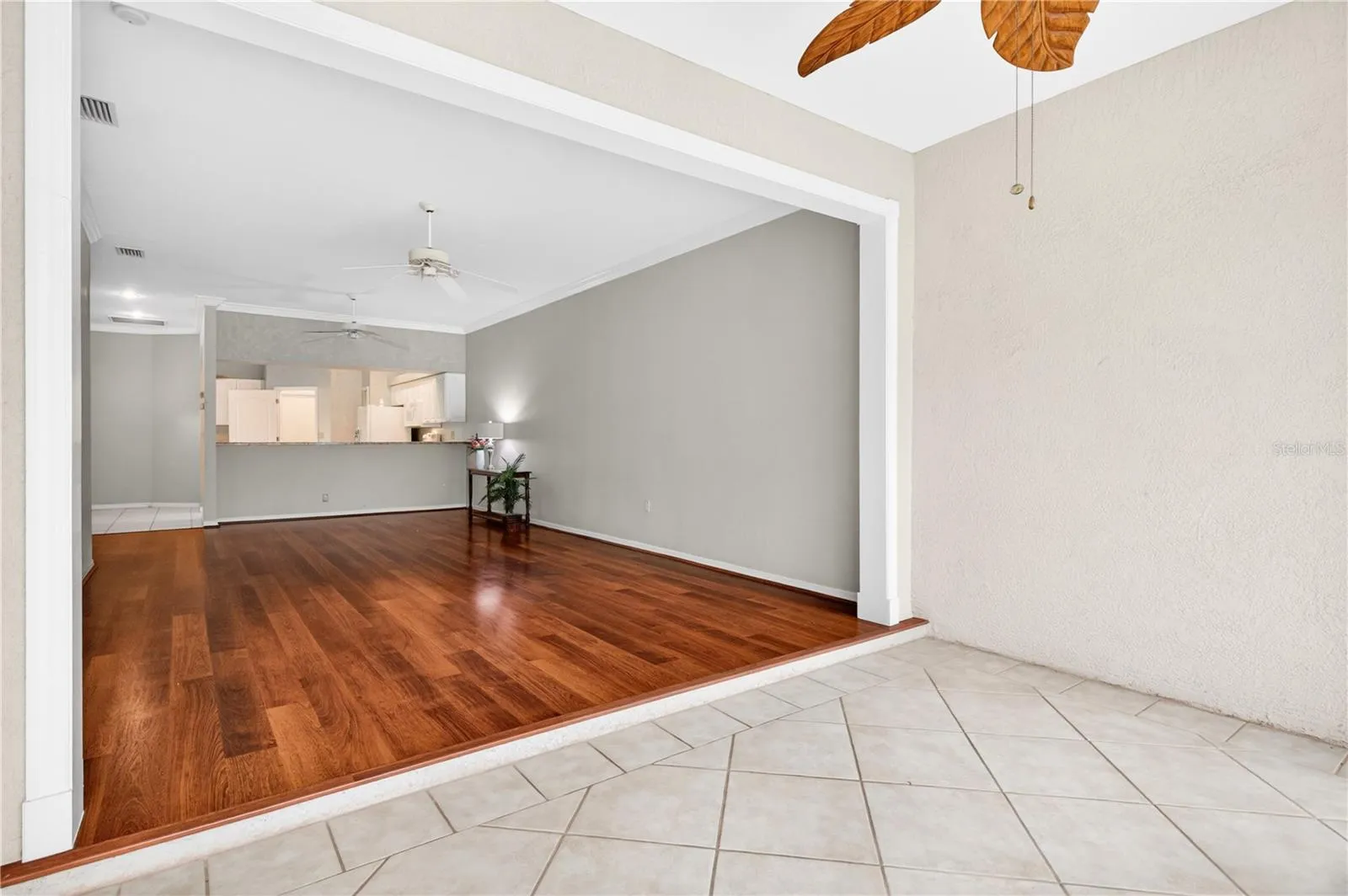 Opposite side with bar open to kitchen from dining room