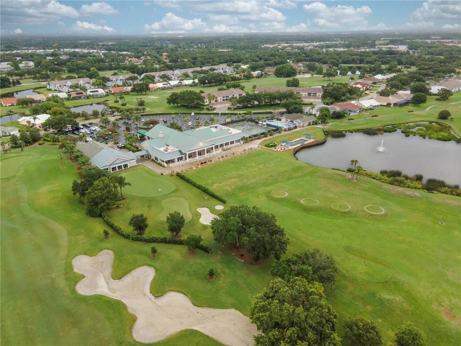 The driving range is immediately behind the clubhouse