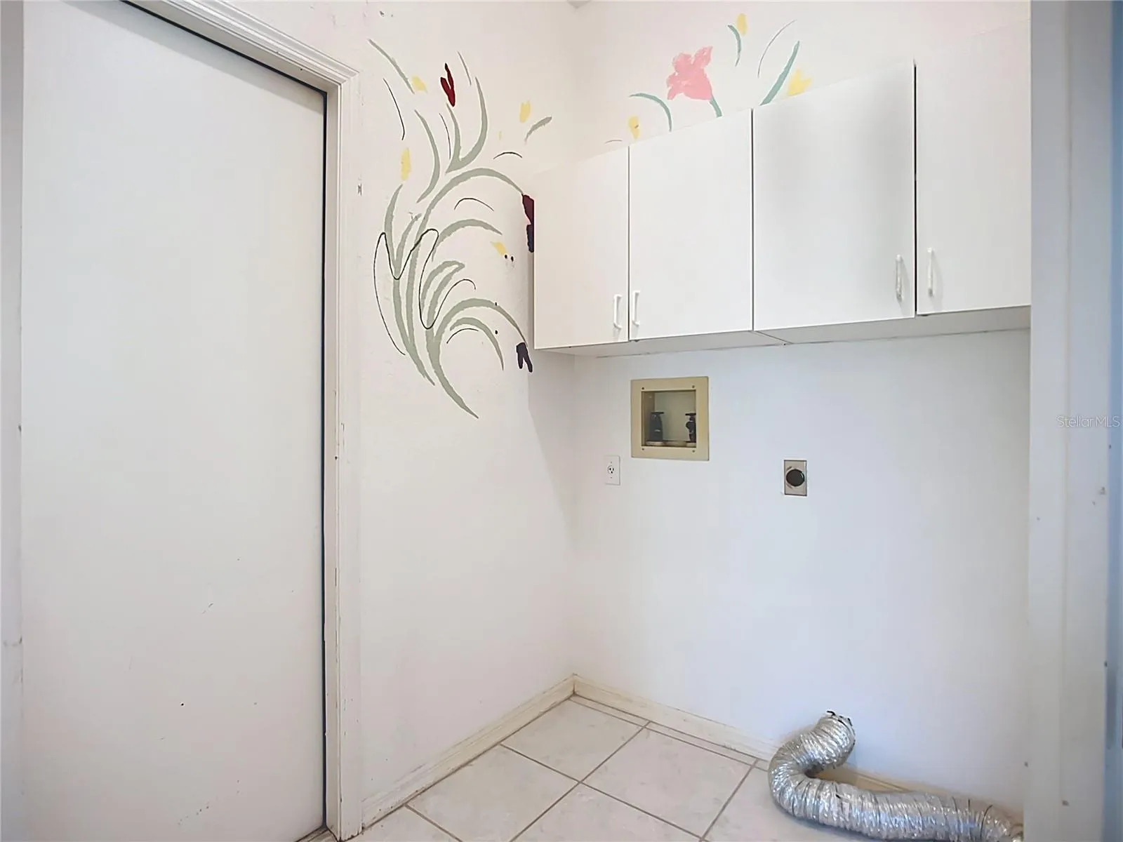 Inside laundry is just off the kitchen and garage