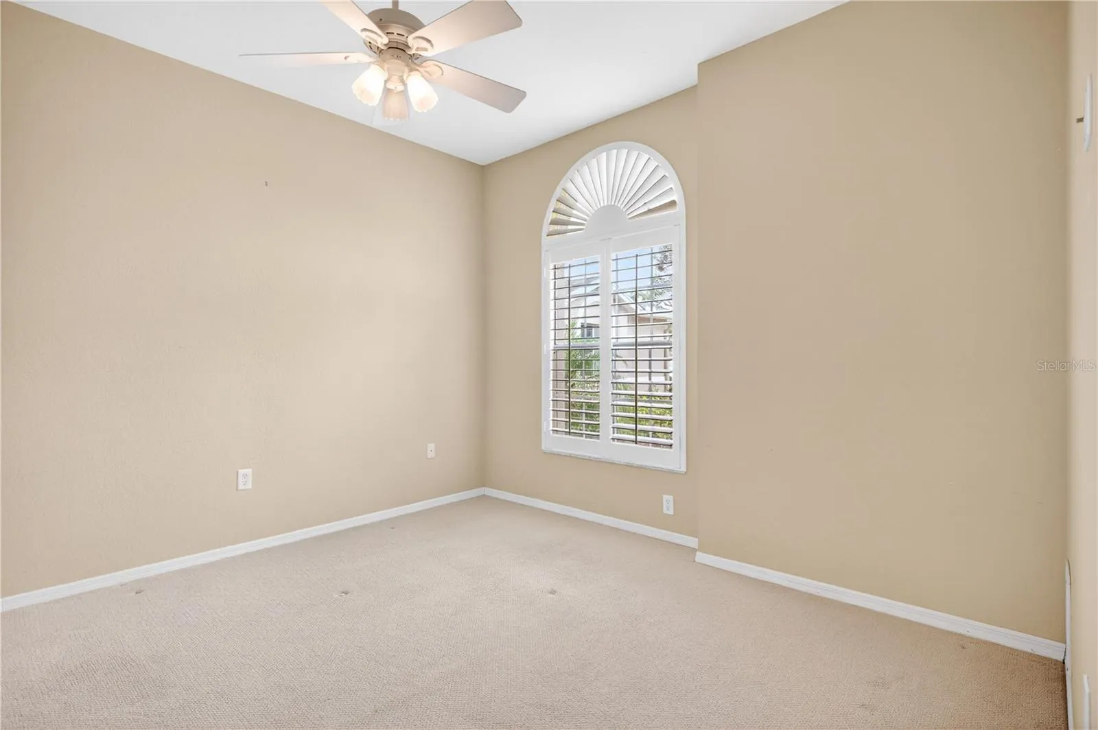 Bedroom two with West facing large sunlit window