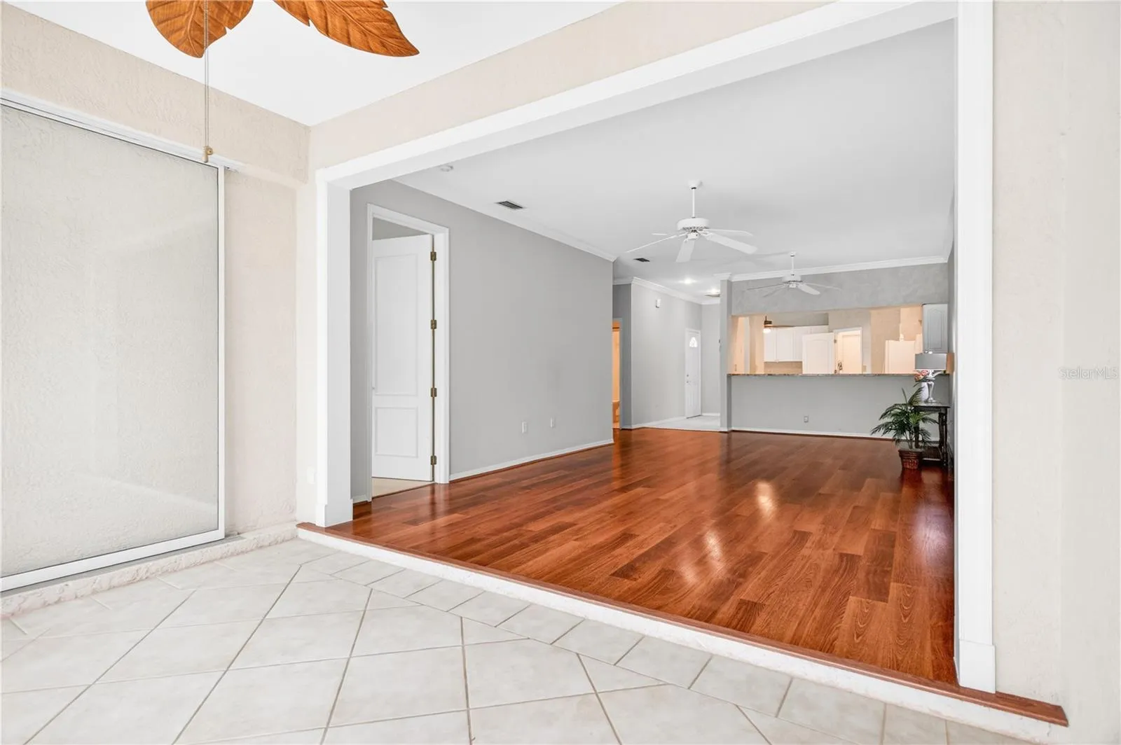 View into living/dining rooms from sliders in lanai