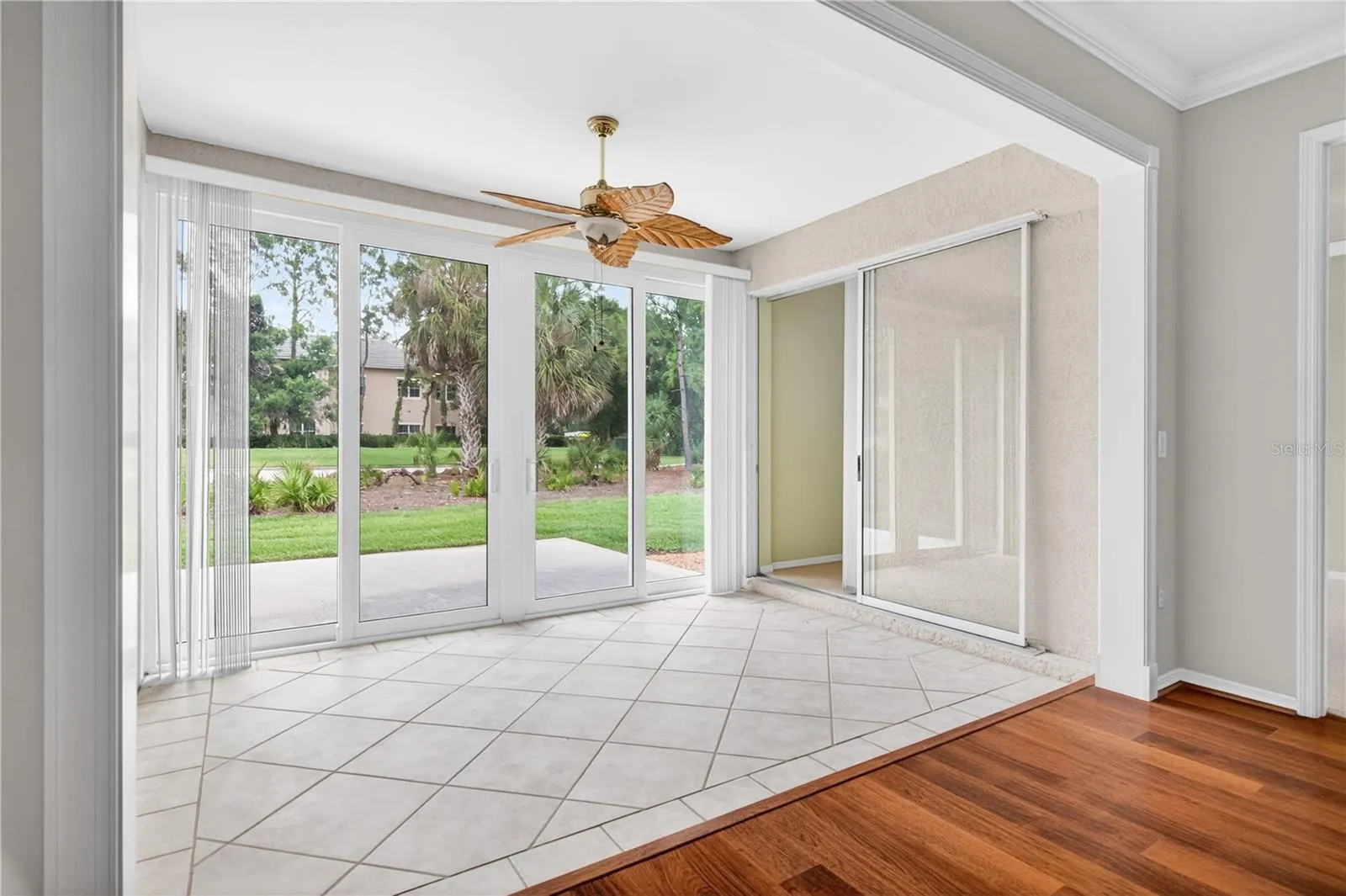 Year round lanai extensa living room and open to outdoor patio