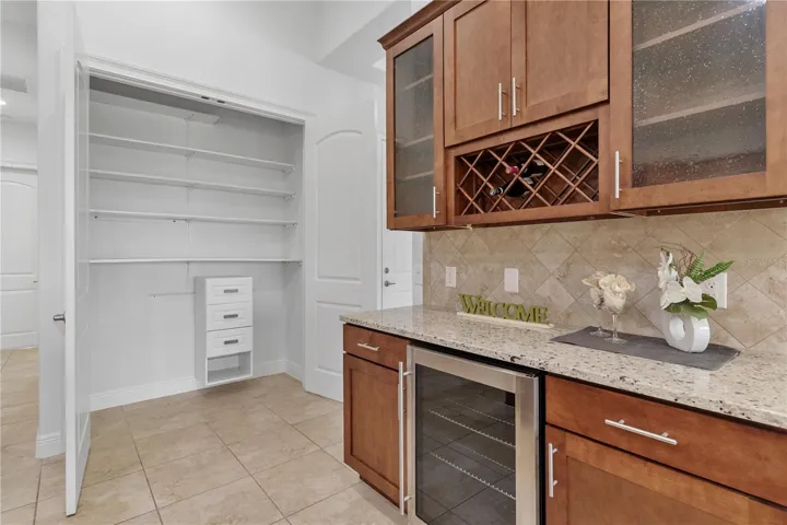 Wine bar with a built-in wine rack and wine cooler
