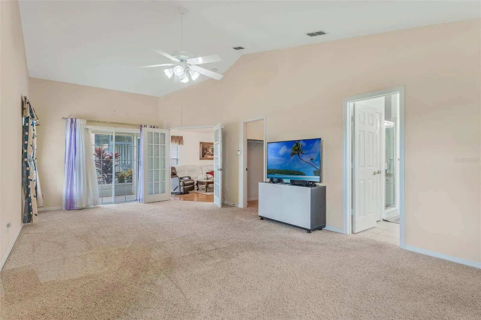 Primary Bedroom with view of water