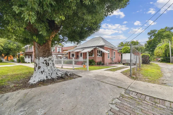 corner parcel with Highland Ave on the East side, Frances on the south side and an alley on the north side