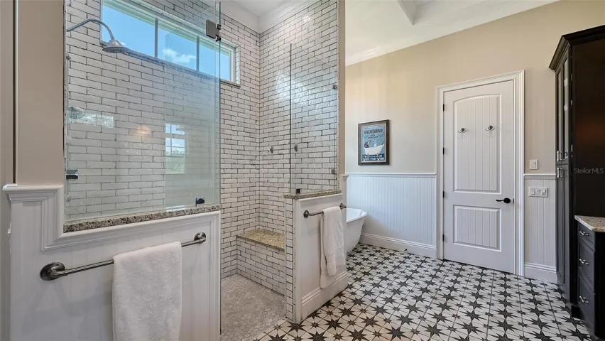 Both Primary Bedrooms have access this sumptuous Primary bathroom.