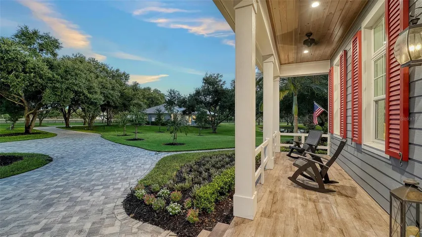 Designed for discerning buyers, this luxurious residence offers unparalleled comfort, style, and functionality in every detail. From its robust foundation to its sophisticated interiors, every feature has been meticulously crafted to elevate modern living. The home is adorned with 35 cedar decorative brackets (2"x4"), stunning stucco-coated front porch columns featuring decorative foam bases and caps, and prefinished foam shutters that enhance its curb appeal. Faux beams and louvers on the front elevation add an extra layer of charm, making this residence not just a home, but a true masterpiece of design and elegance.