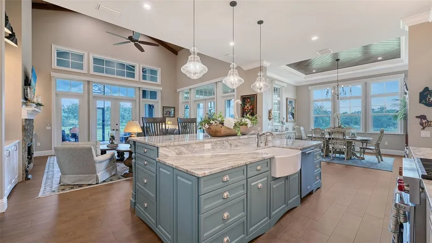 The kitchen features Marsh Full Overlay cabinets (Level 8 & 10) throughout, including the pantry and wet bar, complemented by upgraded closet shelving in the pantry.