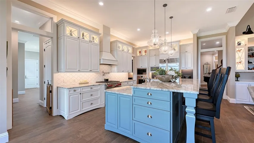 The Gourmet Kitchen measures an impressive 22' x 12' and includes a HUGE Butler's Pantry and 6' x 10' walk-in-pantry.