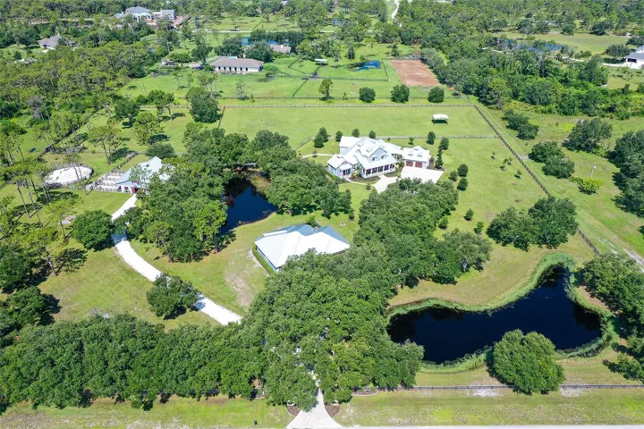 All 3 structures have metal roofs, and there is no need to fear a storm, as the main home is protected with lightning rods and a Kohler 25Kw water-cooled gas generator with transfer switch included, capable of powering the entire home for a full month or more.