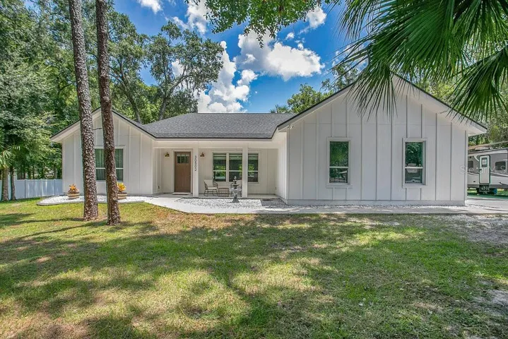 Welcome to this beautifully designed 4-bedroom, 2.5-bath home nestled on an oversized, FULLY FENCED LOT in peaceful Mt. Plymouth.