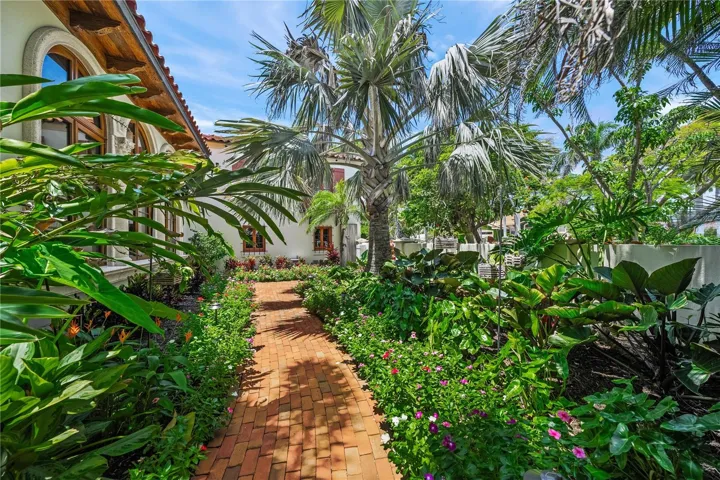 FOLLOW THE RED BRICK ROAD TO YOUR BACKYARD OASIS
