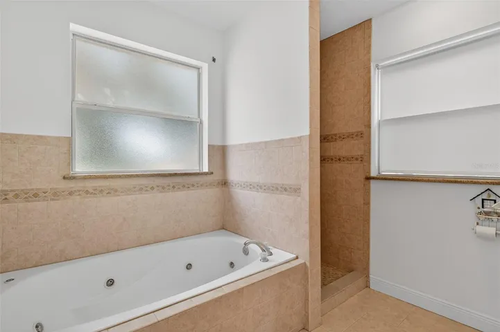 Soaker jet tub in master bathroom