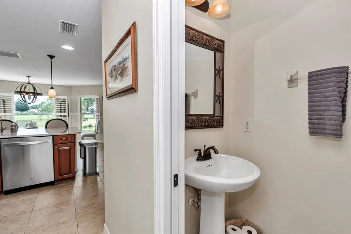 1/2 Bath near Kitchen / Garage